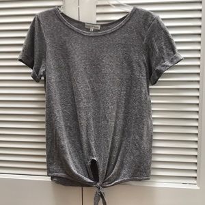 Grey top with knot at bottom